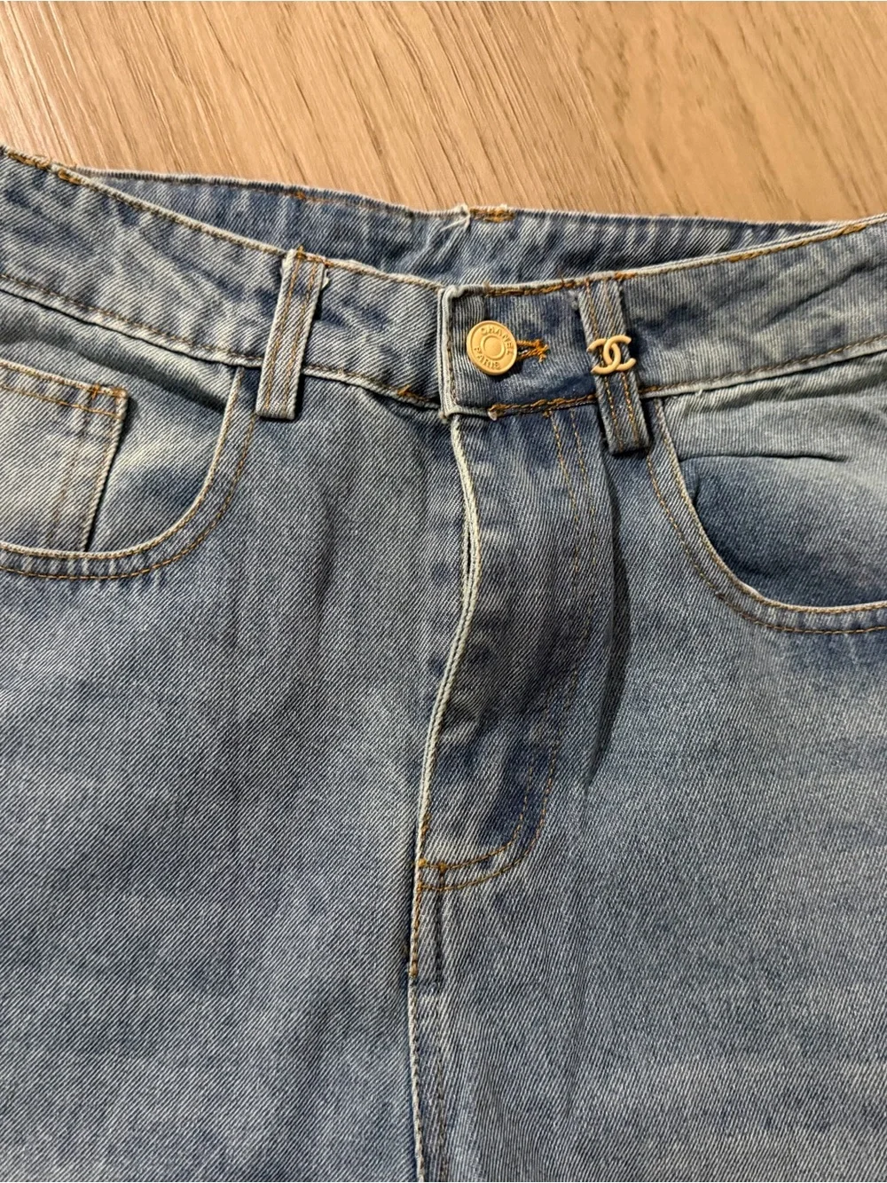 CHANEL Light Wash Wide-Leg Flared Jeans